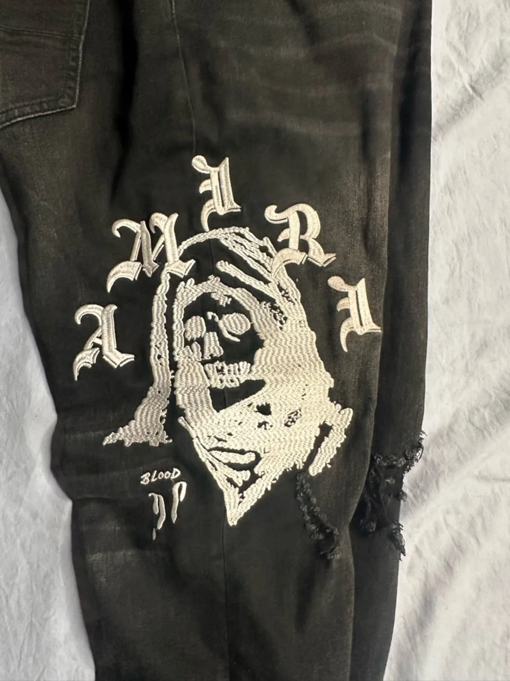 AMIRI Black Skinny Jeans with White Graphic Detailing - Men's - Picture 12 of 16